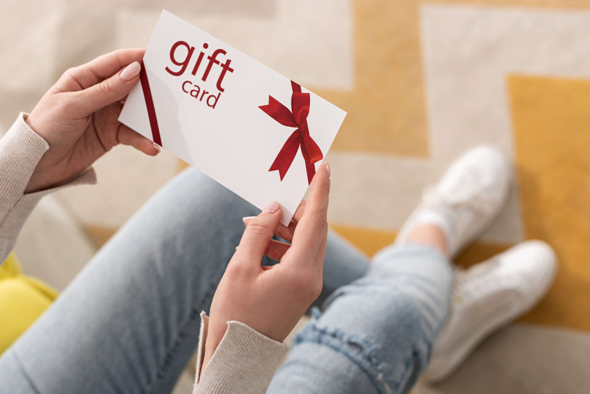 1cropped-view-of-girl-holding-gift-card-with-red-bo-2021-08-30-19-16-02-utc (1)