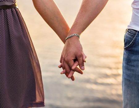 happy-couple-holding-hands
