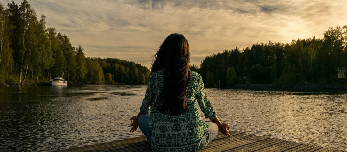 meditation by a calm lake